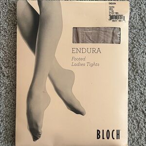 2 pair Bloch Endura Footed Tights. Size A. Color Light tan. Smoke free home. New
